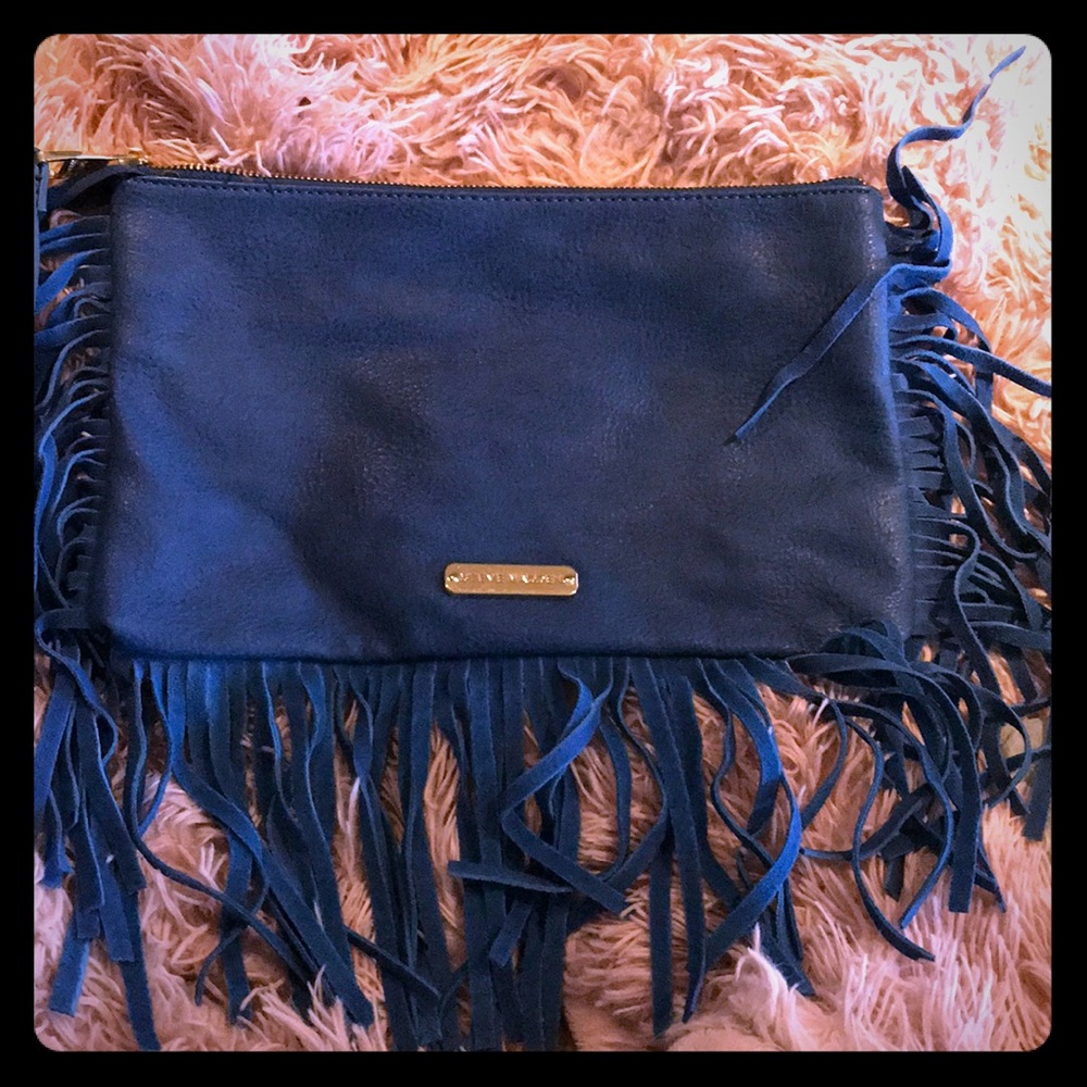 Gently used Steve Madden clutch..